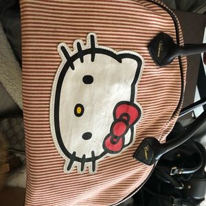 Victoria Beckham, for hello Kitty Kitty hand bag.